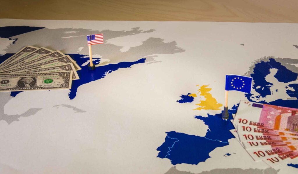 Dollar,And,Euro,american,And,European,Flags,Over,Eu,And,Us